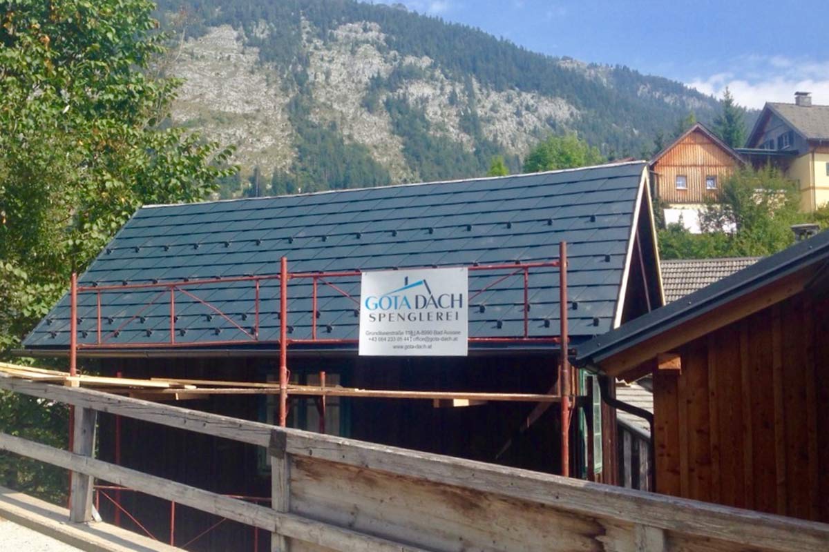 Dachdeckerei mit Schild